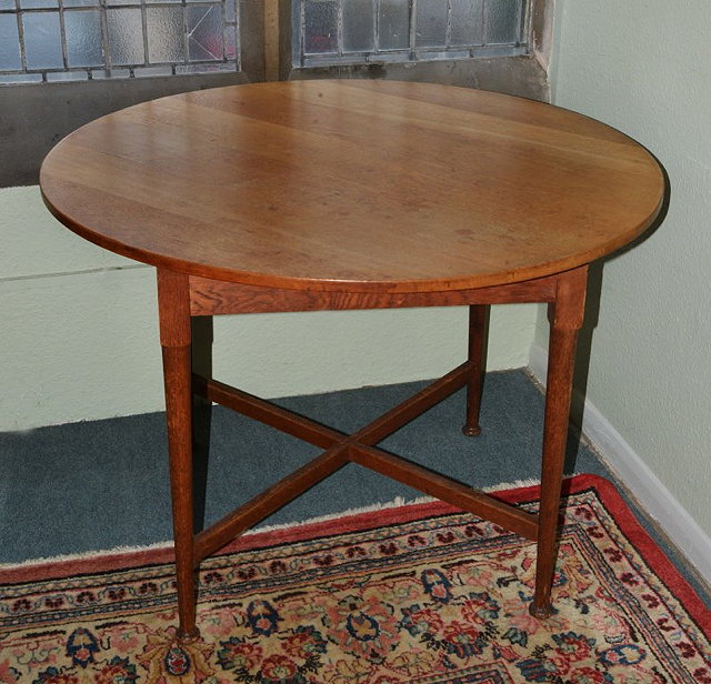 Appraisal: A HEALS CIRCULAR BREAKFAST TABLE with circular tapering legs and