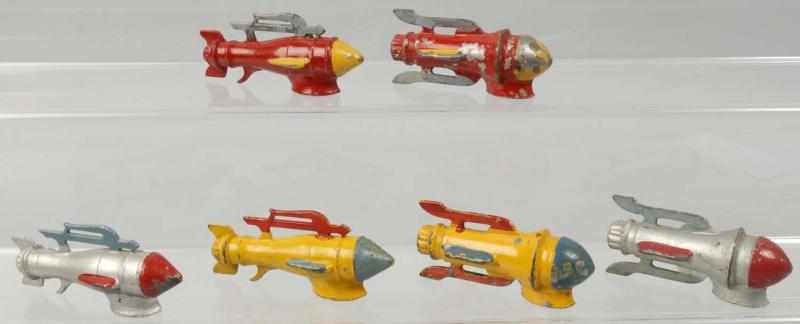 Appraisal: Lot of Diecast Barclay Rocket Ship Toys Description American Circa