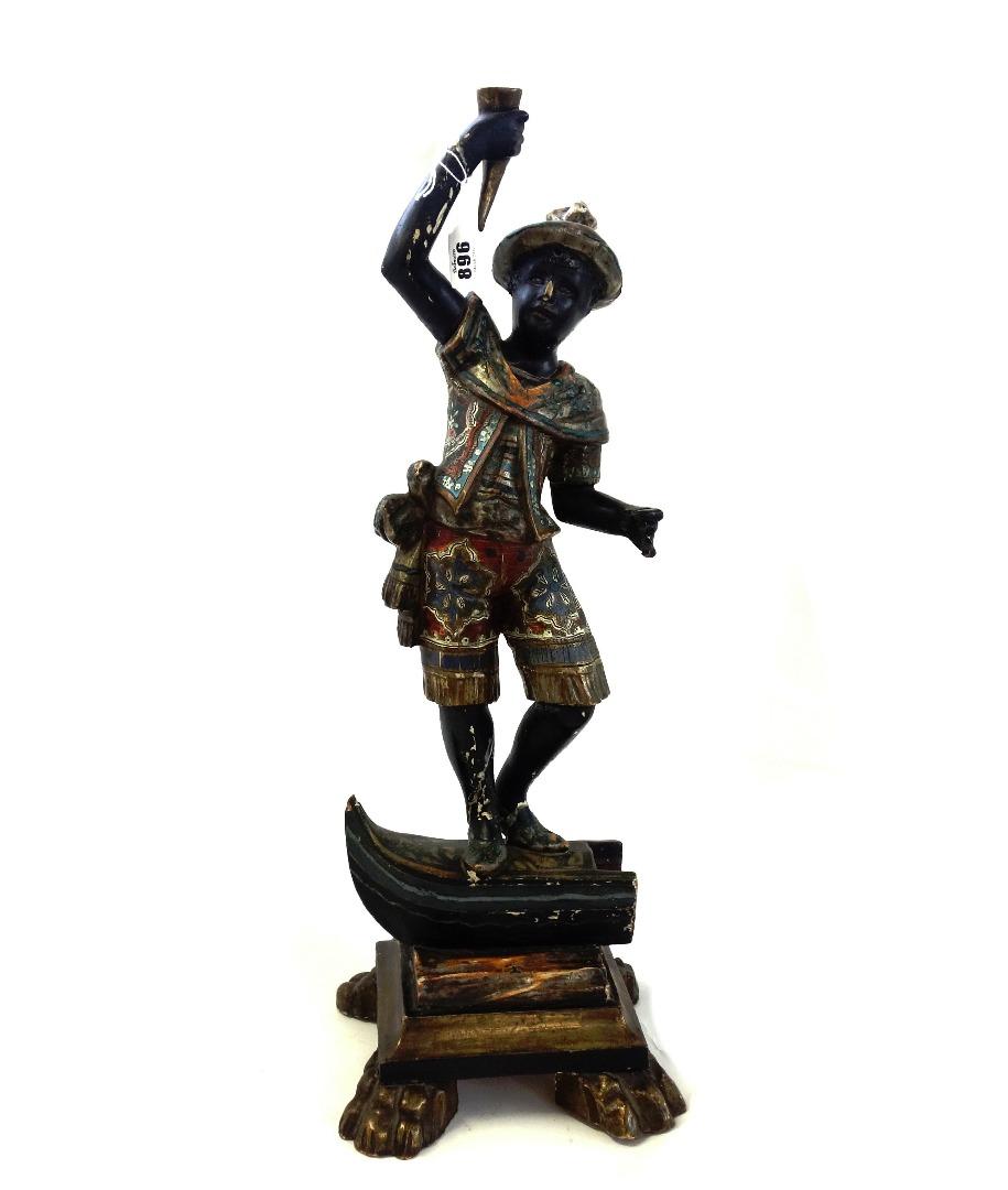 Appraisal: A Venetian polychrome ebonised and gilt Blackamoor figure th century