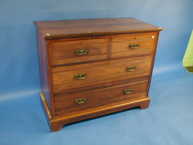 Appraisal: A late Victorian walnut five drawer chest by Maple Co