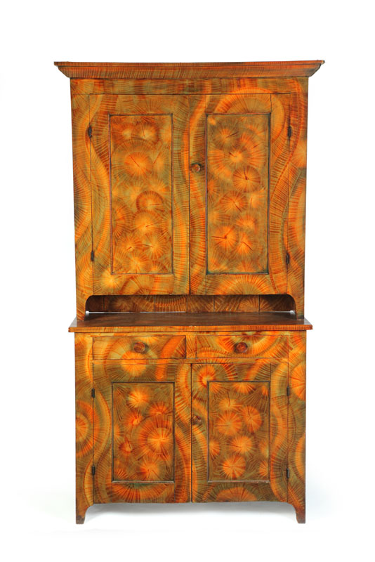 Appraisal: DECORATED CUPBOARD American late th century pine Two piece cupboard