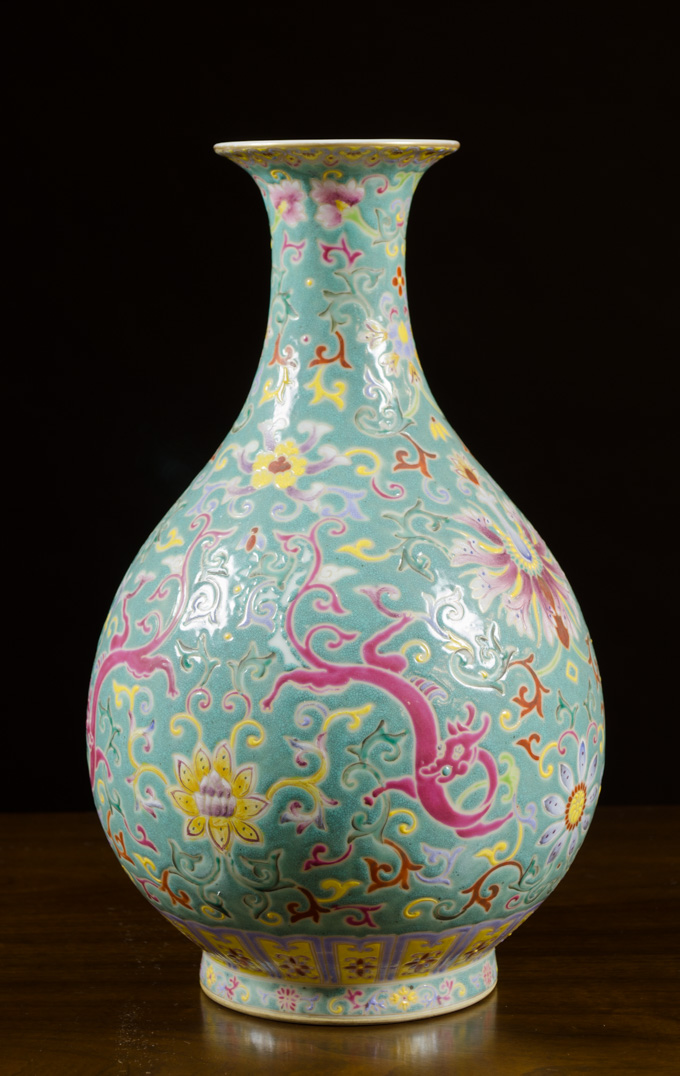 Appraisal: QING STYLE FAMILLE ROSE PORCELAIN VASE of pear form decorated