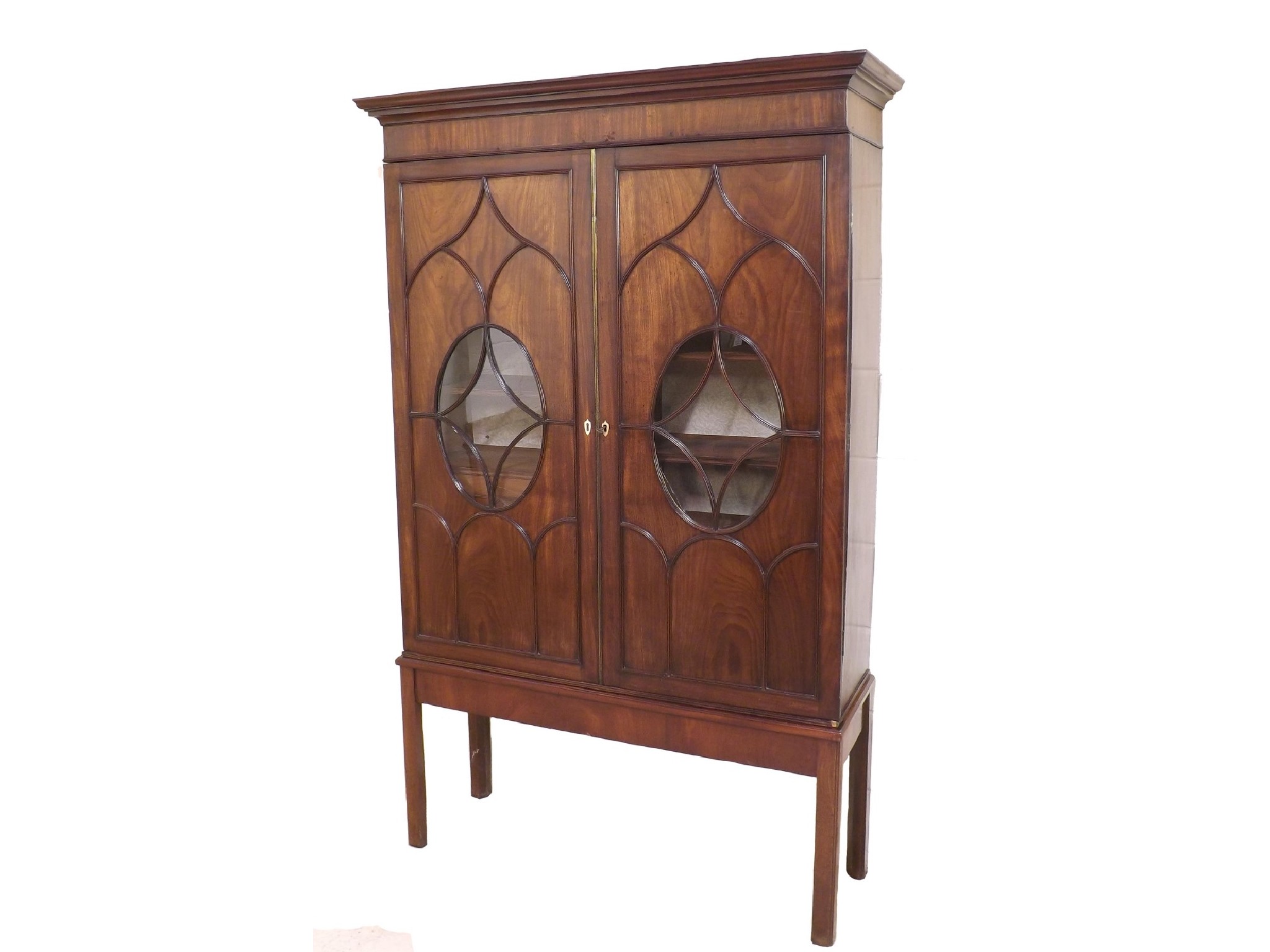 Appraisal: Early th century mahogany cabinet on stand the twin cupboard