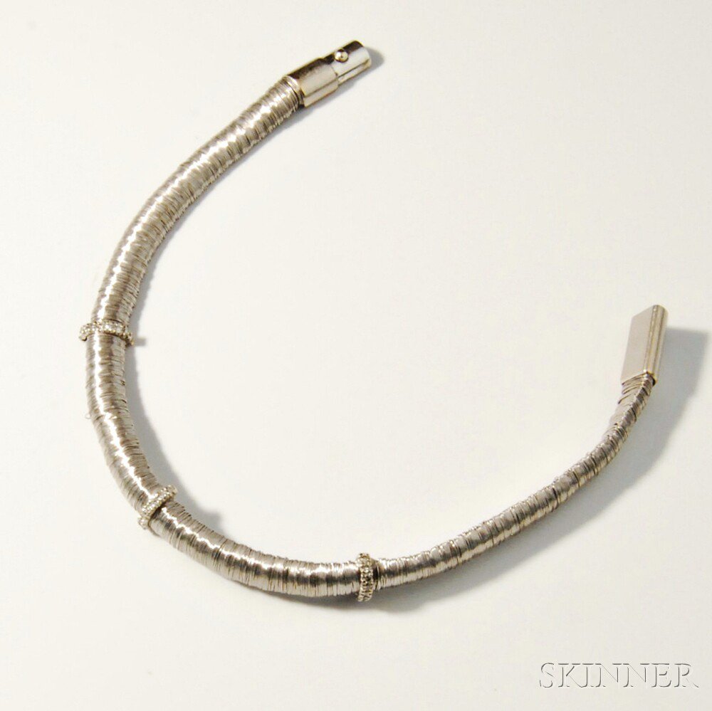 Appraisal: kt White Gold and Diamond Bracelet Yvel wrapped with white