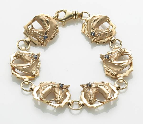 Appraisal: A diamond sapphire and k gold horse motif link bracelet