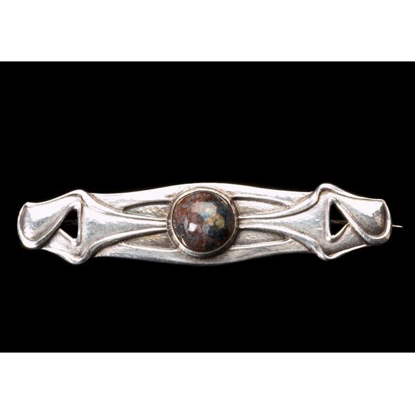 Appraisal: JARVIE Rare hammered sterling silver brooch with an agate cabochon