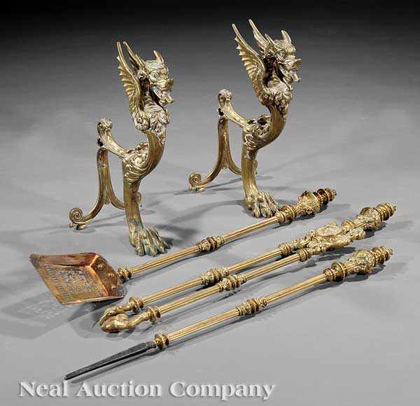 Appraisal: A Pair of Antique Brass Griffin Andirons and Fireplace Tools