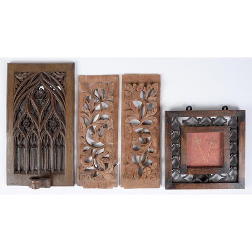 Appraisal: A gothic style carved wood mirror with candle sconce cm