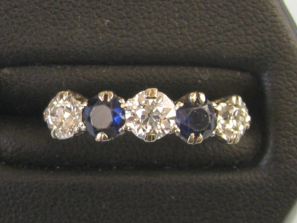 Appraisal: A Sapphire and Diamond five stone Ring claw-set three old-cut