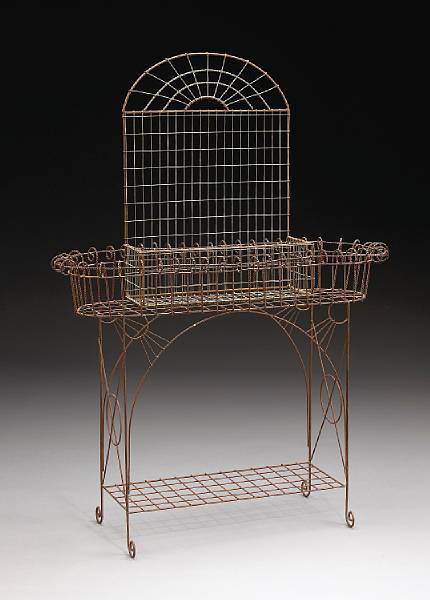 Appraisal: A Victorian style wirework plant stand together with a similar