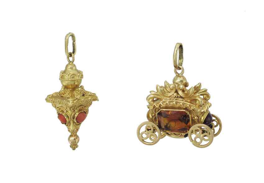 Appraisal: TWO CHARMING K GOLD GEMSTONE CHARMS Mechanical wheel turning carriage