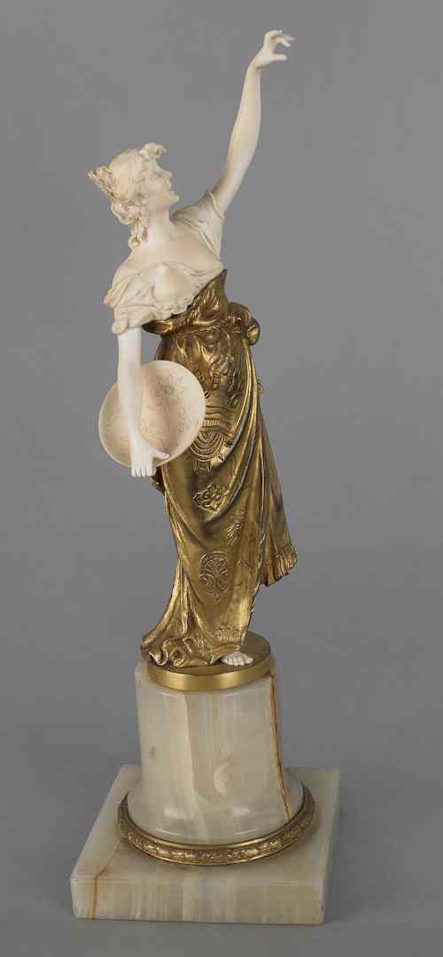 Appraisal: Oskar Gladenbeck German - ivory gilt and onyx figure of