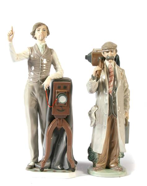 Appraisal: Two Lladro porcelain figures of early photographers height of tallest