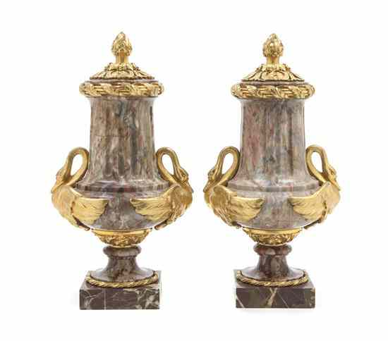 Appraisal: A Pair of Empire Gilt Bronze Mounted Marble Urns having