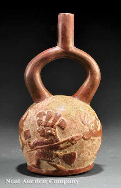 Appraisal: A Pre-Columbian Stirrup Handled Pottery Vessel Mochica IV - V