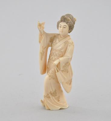 Appraisal: Dancing Geisha Carved ivory of a dancing Geisha with fans