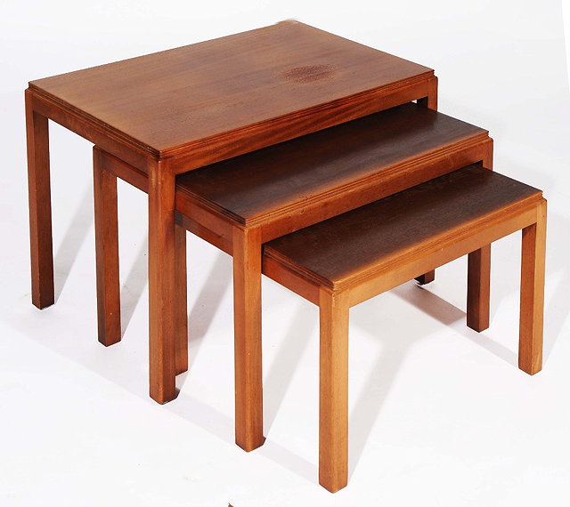 Appraisal: A NEST OF THREE GORDON RUSSELL LTD OCCASIONAL TABLES each