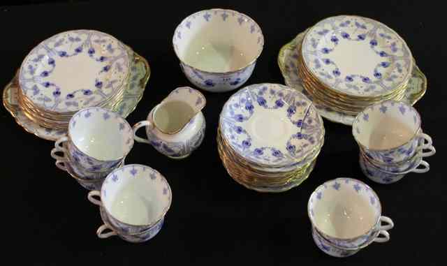 Appraisal: A ROYAL DOULTON BLUE AND WHITE TEASET comprising two plates