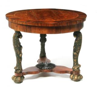 Appraisal: A rosewood burl veneered and gold painted circular center table