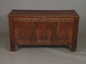 Appraisal: A carved oak coffer th century and later the moulded