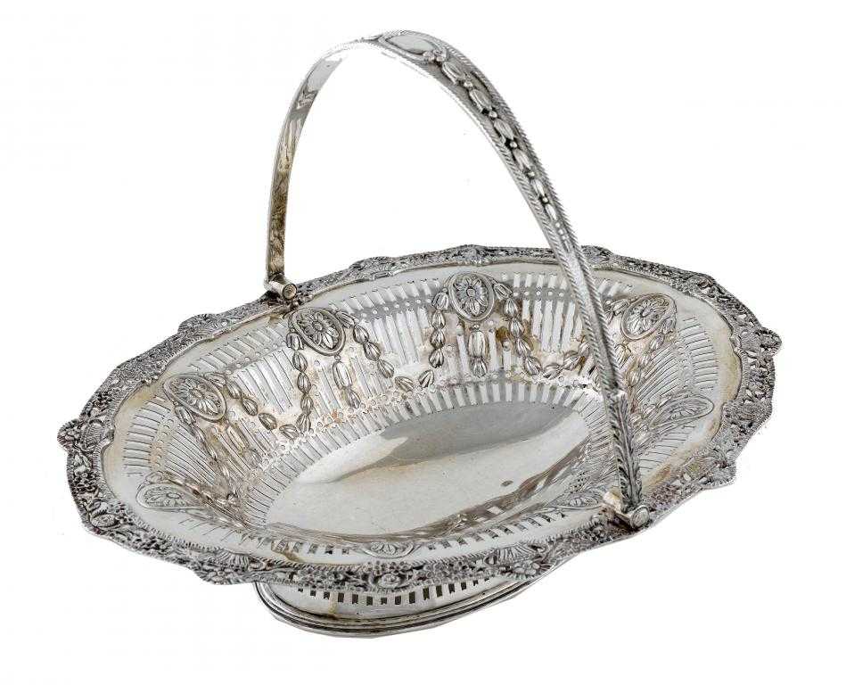 Appraisal: A VICTORIAN OVAL CAKE BASKET pierced and embossed with husks