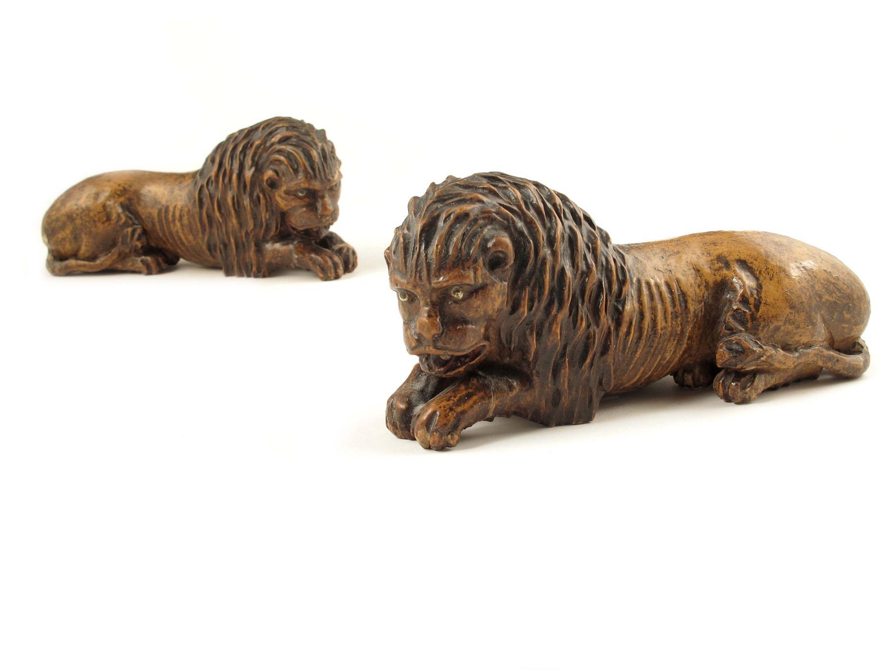 Appraisal: A pair of North Italian carved and painted wood models