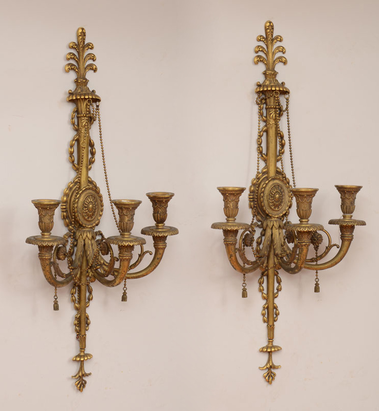 Appraisal: Pair of Neoclassical Style Gilt-Metal Three-Light Wall Appliqu s Caldwell