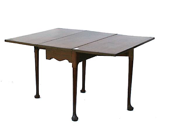 Appraisal: A George III style mahogany drop leaf table height in