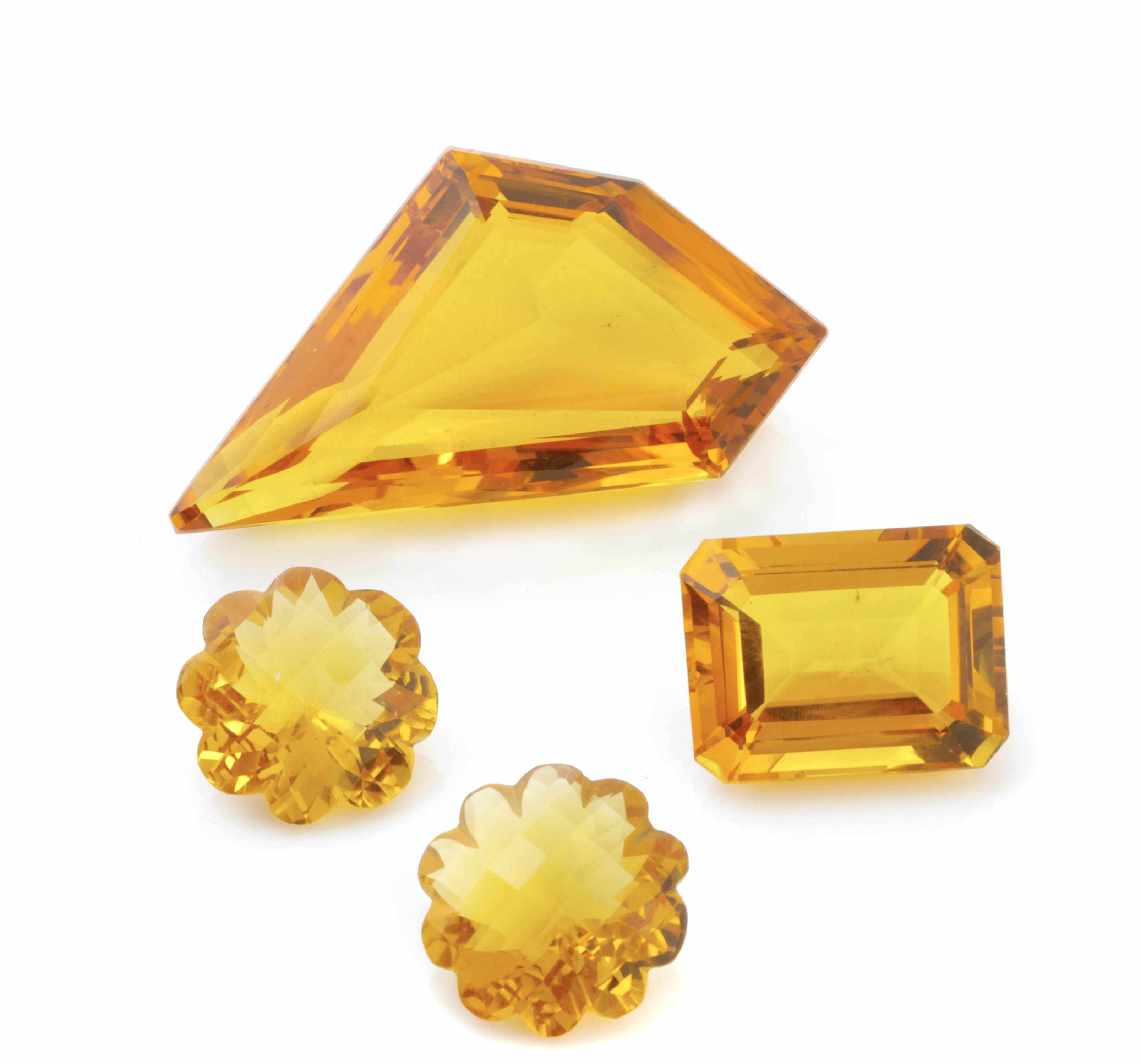 Appraisal: Group of Four Citrines Comprising two fancy-shaped flowers a slanted