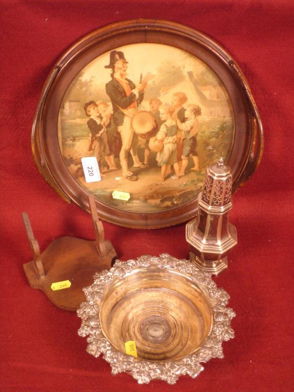 Appraisal: A circular mahogany tray inset with a print of a