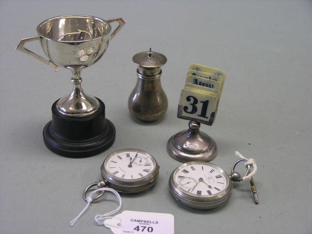 Appraisal: Two silver pocket watches a silver pepper pot silver two