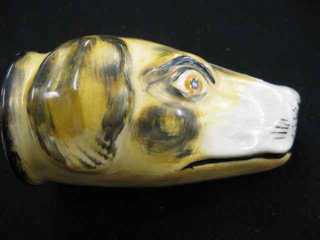 Appraisal: Staffordshire Earthenware Stirrup Cupof a dog's head '' scarce excellent