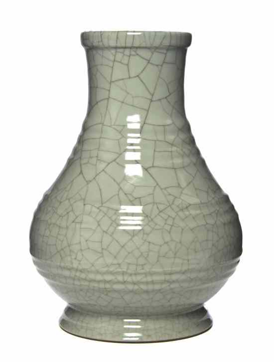 Appraisal: A Chinese Celadon Glaze Baluster Vase having raised decorative rings