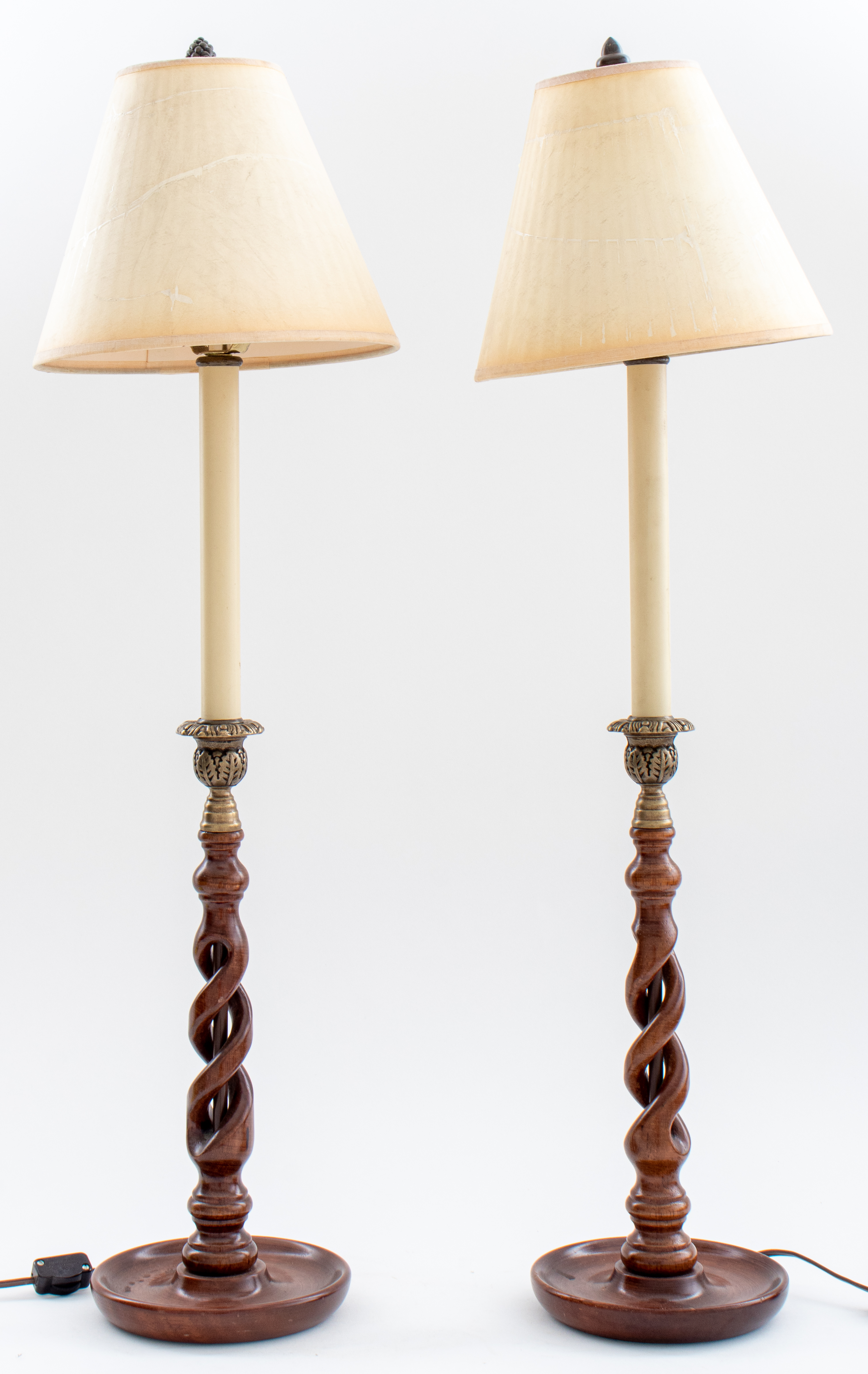 Appraisal: BARLEY TWIST CANDLESTICK LAMPS PAIR Pair of Barley twist brass-mounted