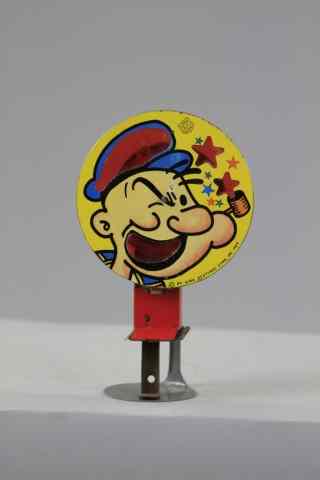 Appraisal: POPEYE SPARKLER Chein King Features Synd lithographed tin celluloid hat