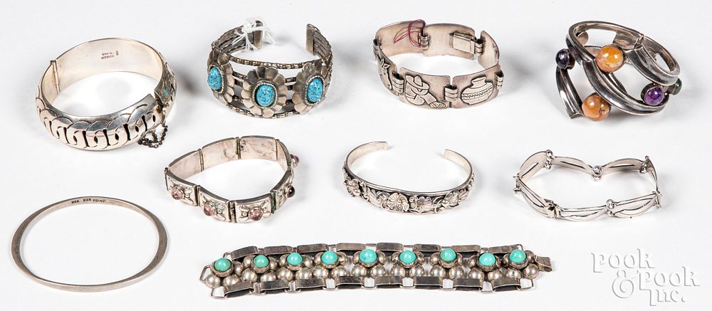 Appraisal: Silver Native Indian Mexican bracelets Collection of silver Mexican bracelets