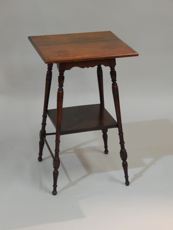 Appraisal: A mahogany occasional table on turned legs cm wide