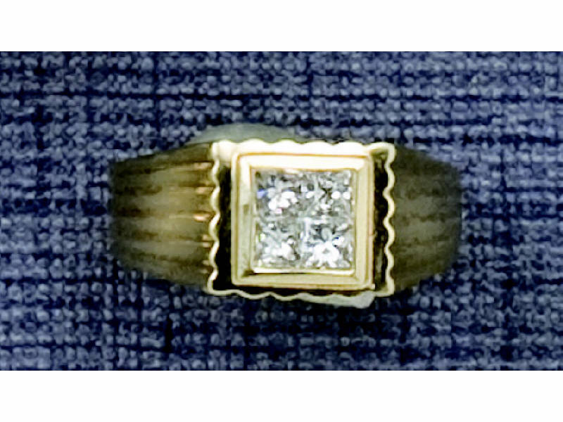 Appraisal: DIAMOND RING Man's k gold ring with four princess cut