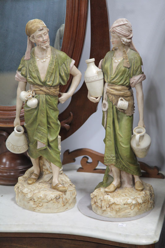 Appraisal: TWO ROYAL DUX FIGURES Czechoslovakia - Water carriers male and