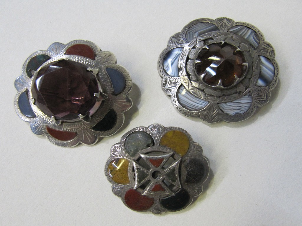 Appraisal: Lot comprising Scottish silver and agate brooch and two white