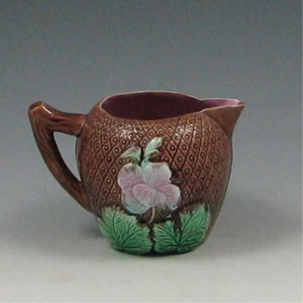 Appraisal: Majolica Flowered Creamer marked with hand glazed X factory clay