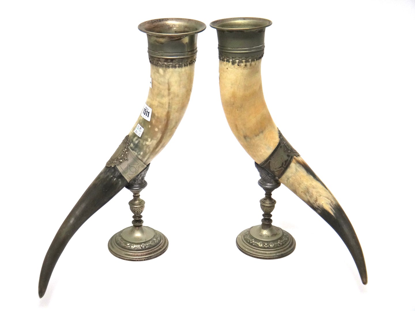 Appraisal: Two formerly silver plated metal mounted horn ceremonial drinking vessels