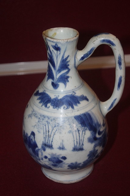 Appraisal: A CHINESE BLUE AND WHITE EWER with landscape scene late