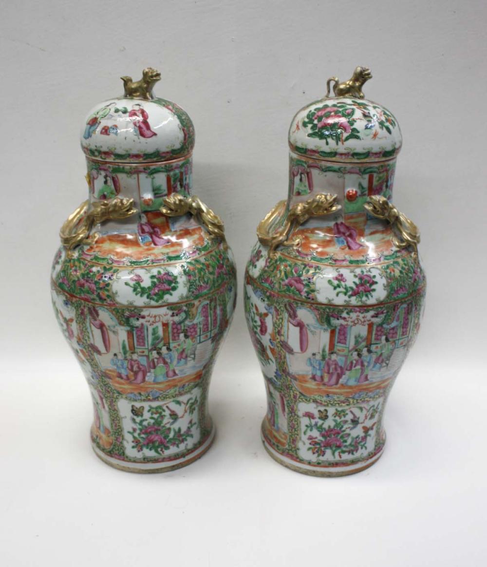 Appraisal: PAIR OF CHINESE ROSE MEDALLION PORCELAIN LIDDED URNS of baluster