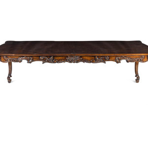 Appraisal: A George II Style Carved Walnut Dining Table th Century