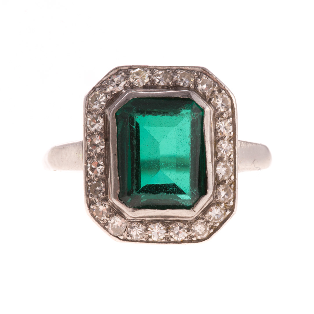 Appraisal: A Lady's Platinum Synthetic Emerald Diamond Ring Platinum ring featuring