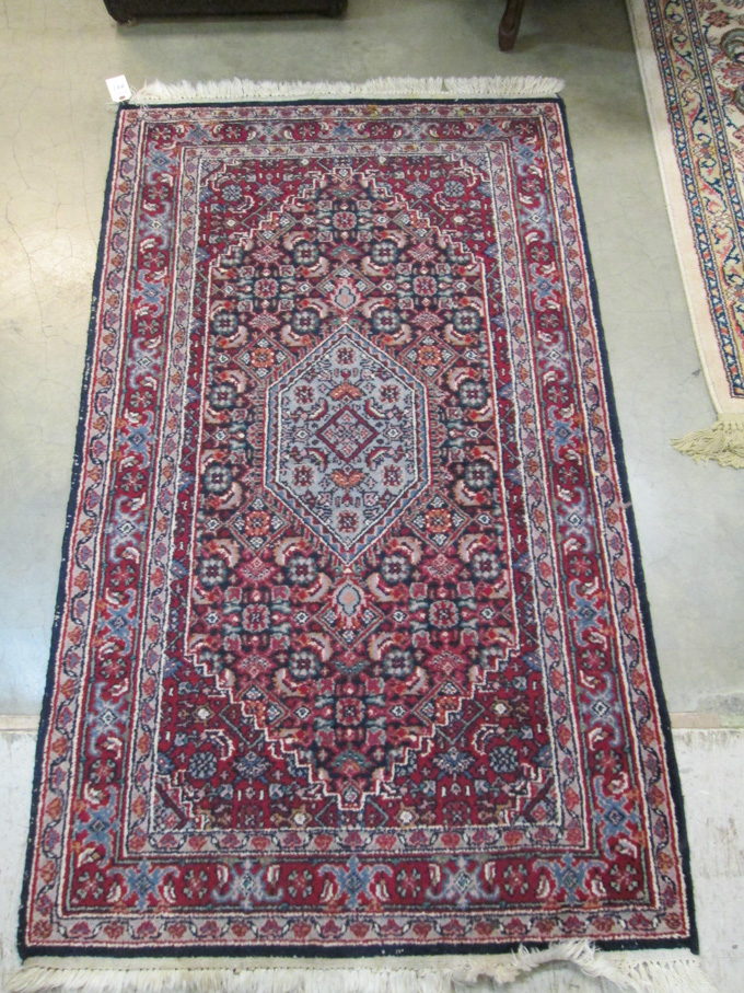 Appraisal: HAND KNOTTED ORIENTAL AREA RUG Indo-Bidjar ' x '