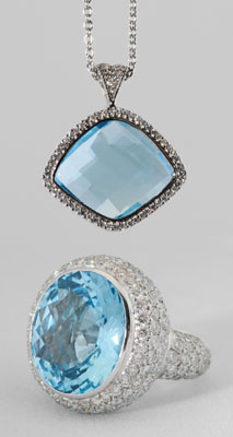 Appraisal: Blue topaz diamond ring pendant ring with central round faceted