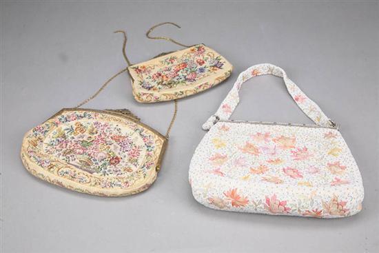 Appraisal: THREE PURSES Floral designs Two are petit point one labeled