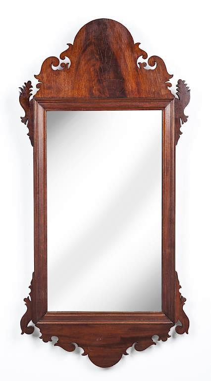 Appraisal: Chippendale Mirror DESCRIPTION Mahogany frame Chippendale mirror with scroll crest